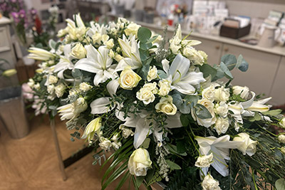 Funeral memorial flower arrangement by All Occasions florist of Howden
