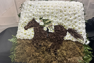 Funeral memorial flower arrangement by All Occasions florist of Howden